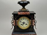 a clock that is sitting on top of a table