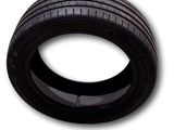 an image of a tire on a white surface with a white background