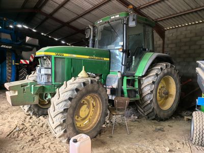 a tractor that is parked inside of a building