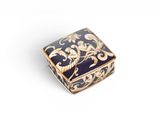 an image of a blue and gold box on a white surface