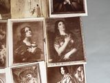 many pictures of women in old fashions on a table