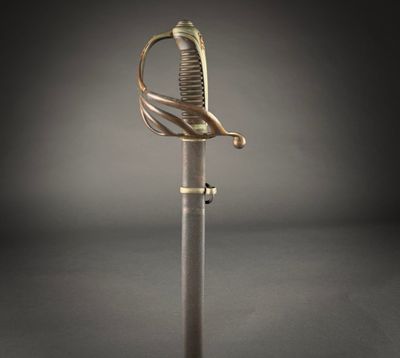 an image of a sword with a metal handle on a black background