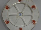 a white plate with a picture of a dog on it