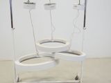 a white table with three lights on it
