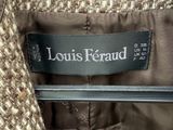L'étiquette sur la veste porte l'inscription « Louis Ferrad ».