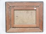 an old picture frame with a picture of a cat in it