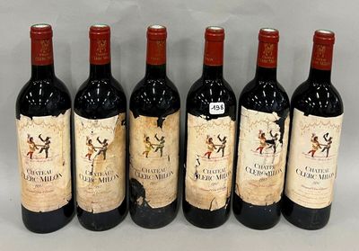 six bouteilles de vin sont alignées dans une rangée
