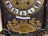 a clock that is sitting on top of a table