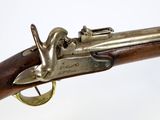 a close up of a gun on a white background with a white background