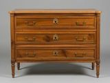 a wooden chest of drawers with brass handles and drawers
