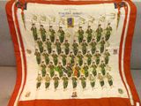 an orange and white scarf with a picture of a group of soldiers on it