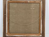 an old picture frame with a rope hanging from it ' s side