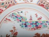 a plate that has a picture of a castle on it