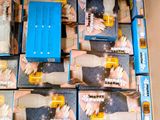 a cardboard box filled with many different types of toys