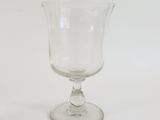 a glass that is sitting on a table