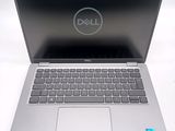 the dell laptop is open and ready to be used