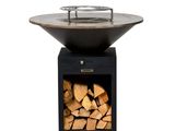 a close up of a fire pit with logs in it