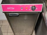 an image of a commercial kitchen with a pink counter top
