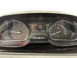 a close up of a car dashboard with a speedometer and gauges