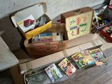 many boxes of comic books sitting on the floor