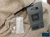 a picture of a bag of luggage with a tag attached to it