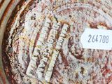 an image of a close up of a pot with a label on it