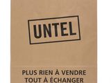 a brown paper bag with the words untel on it