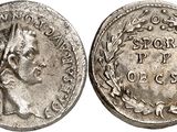 a silver coin with an image of a man on it