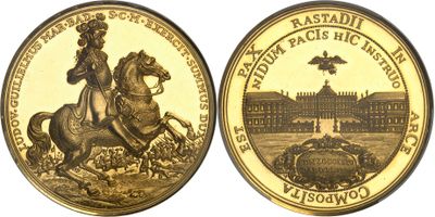 a close up of two gold coins with a woman on a horse