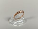 an image of a gold ring with diamonds on it