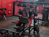 a gym with a lot of equipment in the room