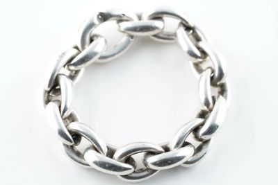 silver chain bracelet on white background with copy space for text