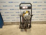 an image of a machine that is sitting in front of a wall