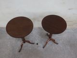 two small tables that are sitting on top of each other