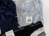 a box of underwear and a pair of underwear on a table