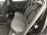the back seats of a car are empty and the seats are empty
