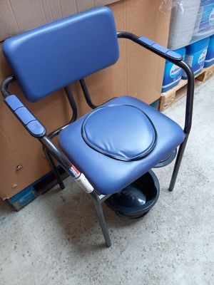 a blue chair that has a seat on it