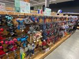 many different types of dog leashes on display in a store