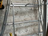 a ladder that is leaning up against a wall