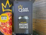 two vending machines that have a pizza on them