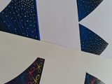 a close up of a piece of paper with a design on it