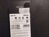the back of a black laptop with a white label on it