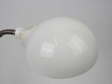 an image of a white light bulb with a black cord