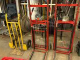many tools that are sitting on the floor in the garage