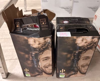 two boxes that have a picture of a man on them