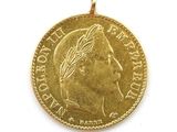 l'image d'une pièce d'or sur laquelle figure le visage d'une femme