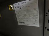 a label on the back of a microwave oven