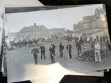 several old black and white photos of men and women standing in front of a building