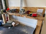 a workbench with a lot of tools on it