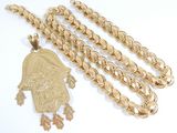 gold chain with a gold pendant and a gold chain with a gold pendant and a gold chain with a gold pendant and a gold chain with a gold pendant with a